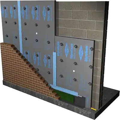 Highly efficient wall insulation being installed on a brick wall for energy efficiency and thermal regulation.