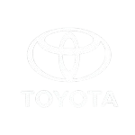 Toyota repair shop with mechanic working on vehicle engine.