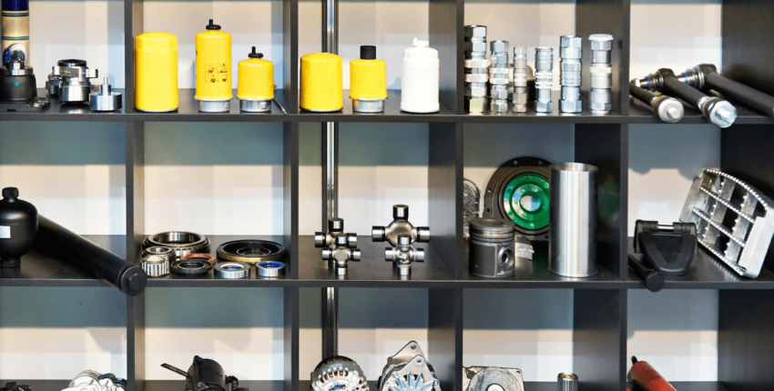 Auto parts shelf with various components for vehicle repairs in Alexandria.