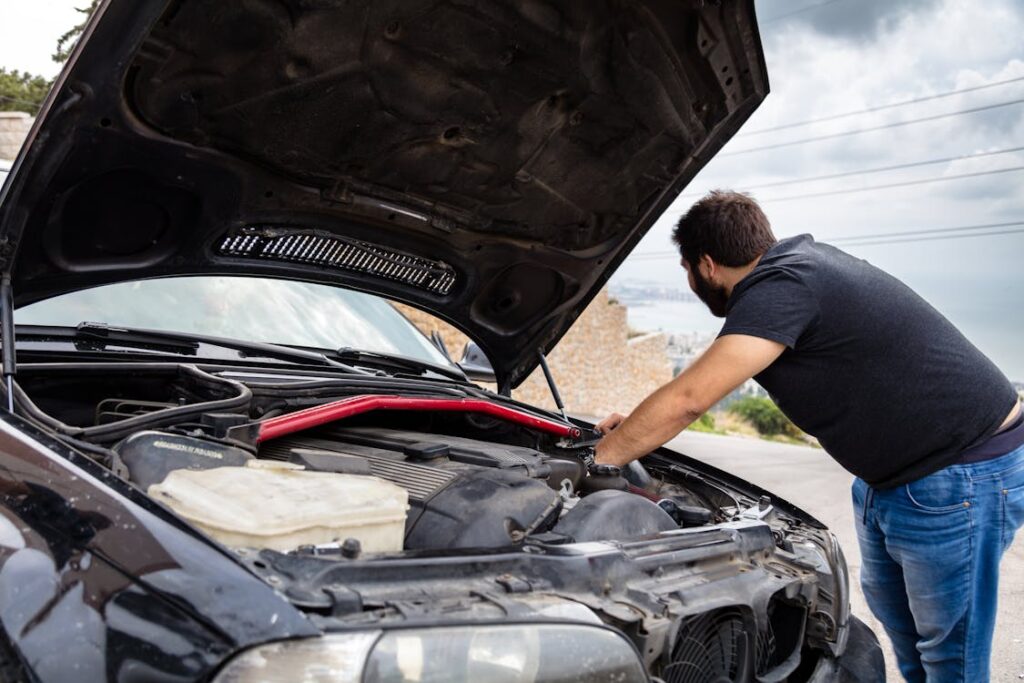 Car engine check for urgent repair needs.