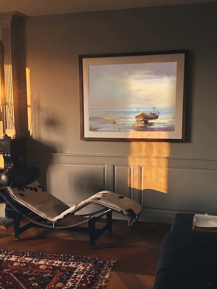 Serene coastal scene with a boat, captured in Bernabé Sedita's limited edition artwork. Perfect for.