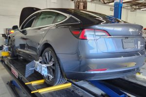 Tesla Model S undergoing electric vehicle diagnostics at Garage-EV Dartmouth.