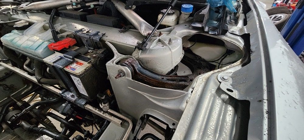 Electric vehicle battery repair process at Garage-EV in Dartmouth.