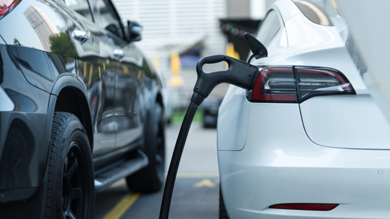 Electric vehicle being charged at a public charging station in Dartmouth, NS.