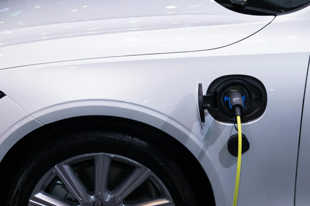 Electric vehicle being charged at a modern charging station in Dartmouth.