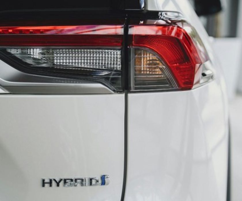 Close-up of hybrid vehicle tail light and hybrid badge in Dartmouth.