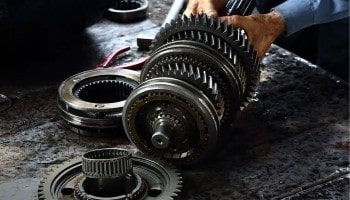 Automotive gearbox and transmission parts being serviced at Global Car Care.