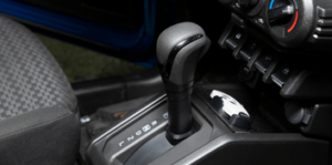 Gear shift lever for automatic transmission in a car interior.