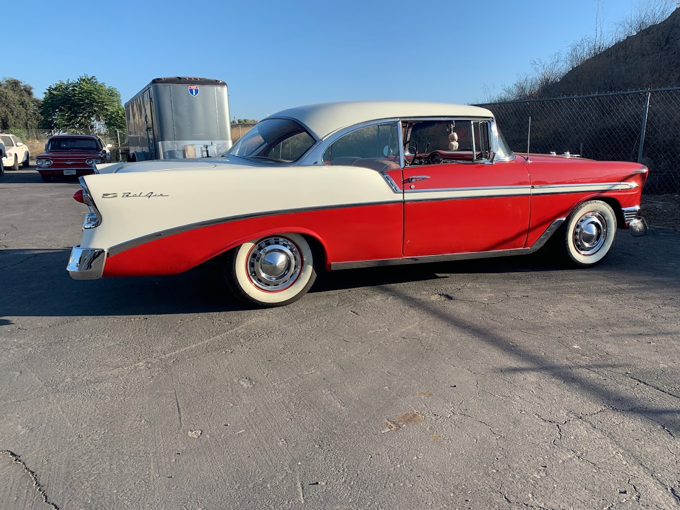 Vintage 1950s Grumpy's Hot Rod car in red and white, classic American automobile.