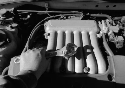 Engine maintenance in progress at Grumpy's Hot Rod shop.