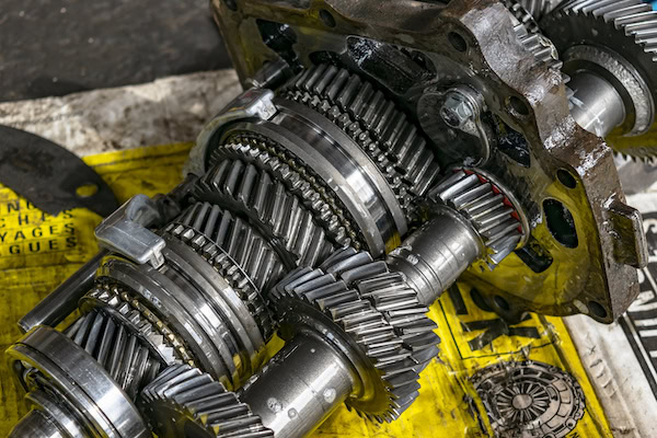 Close-up of transmission gears and components for repair or maintenance.