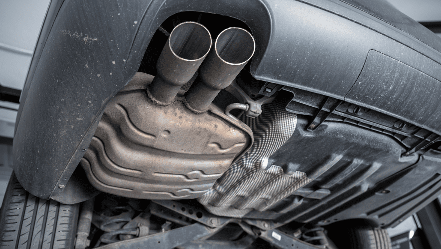 Exhaust system with dual tailpipes, part of vehicle maintenance services at Hillside Auto Clinic.