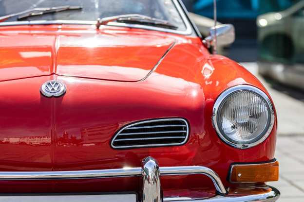Vintage red Volkswagen Beetle, ideal for oil and filter change services at Hillside Auto Clinic.