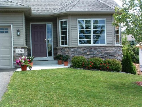House front with stone