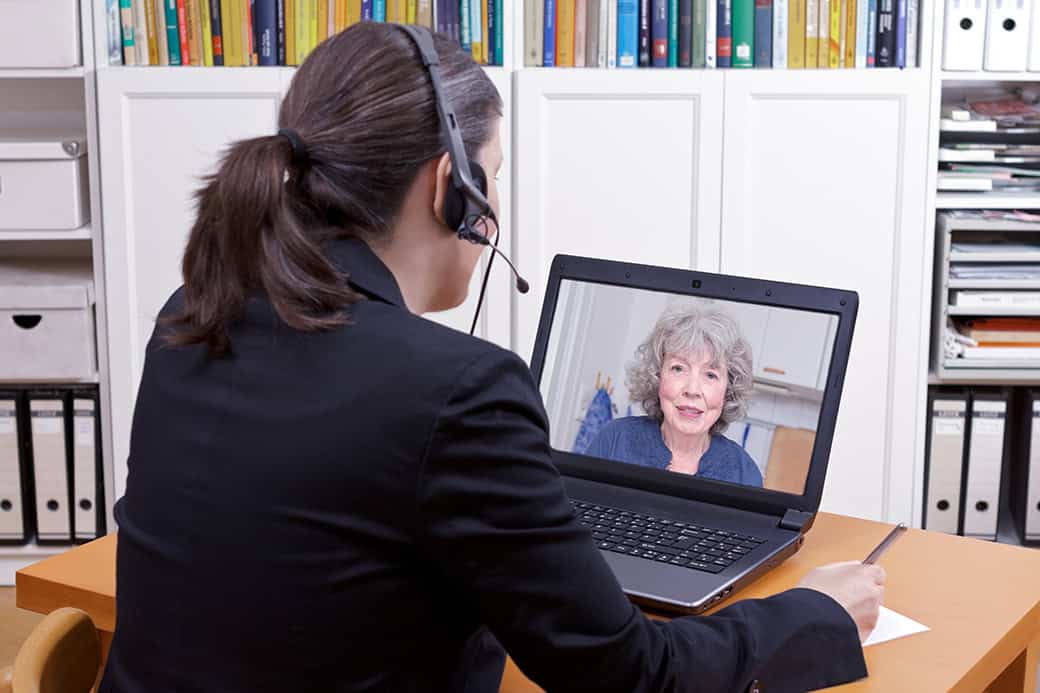 women headset laptop pen paper