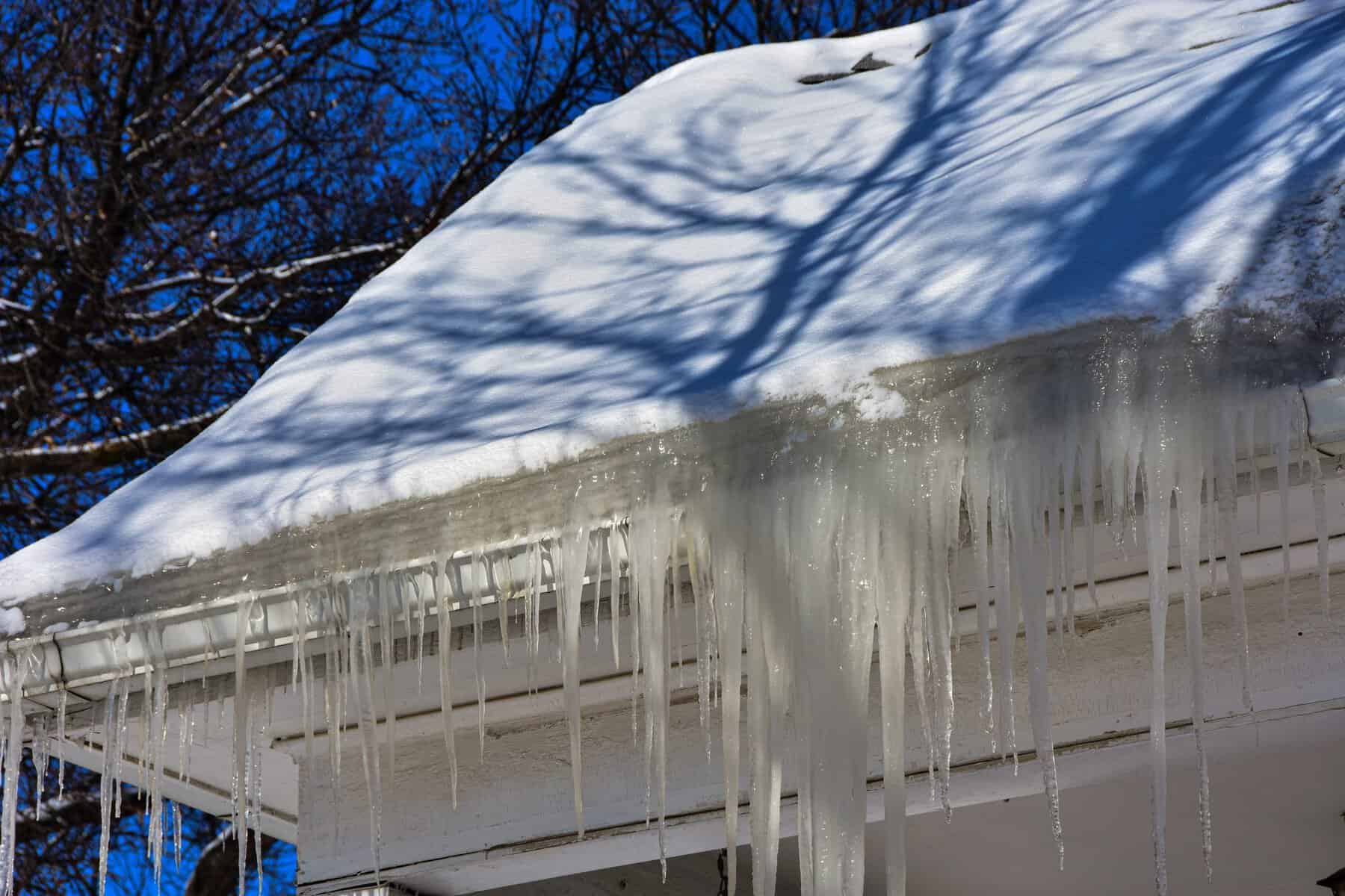 Ice Dams In Roof Gutters From Melting Snow Can Cause Water Damage Inside Home, Insufficient Attic Insulation Is Usually The Cause.