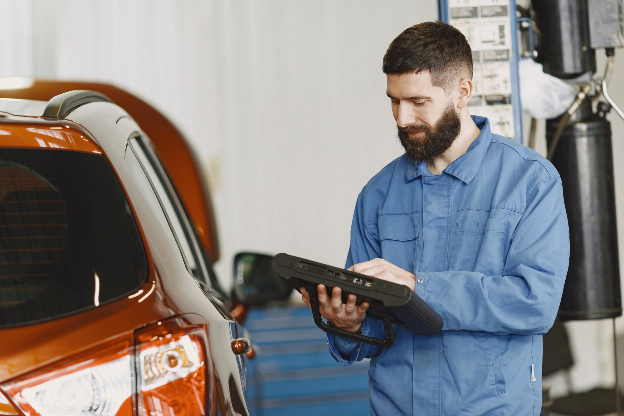 Mechanic conducting vehicle inspection 