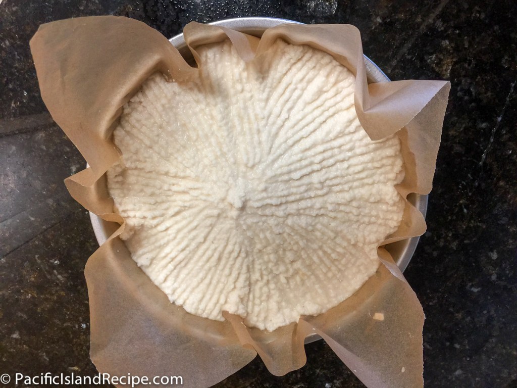 Cassava Cake with pattens made with a folk ready for baking.