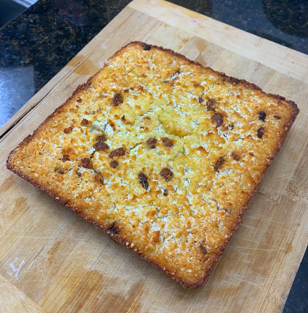 Golden toasted bread with crispy crust and melted cheese on top.