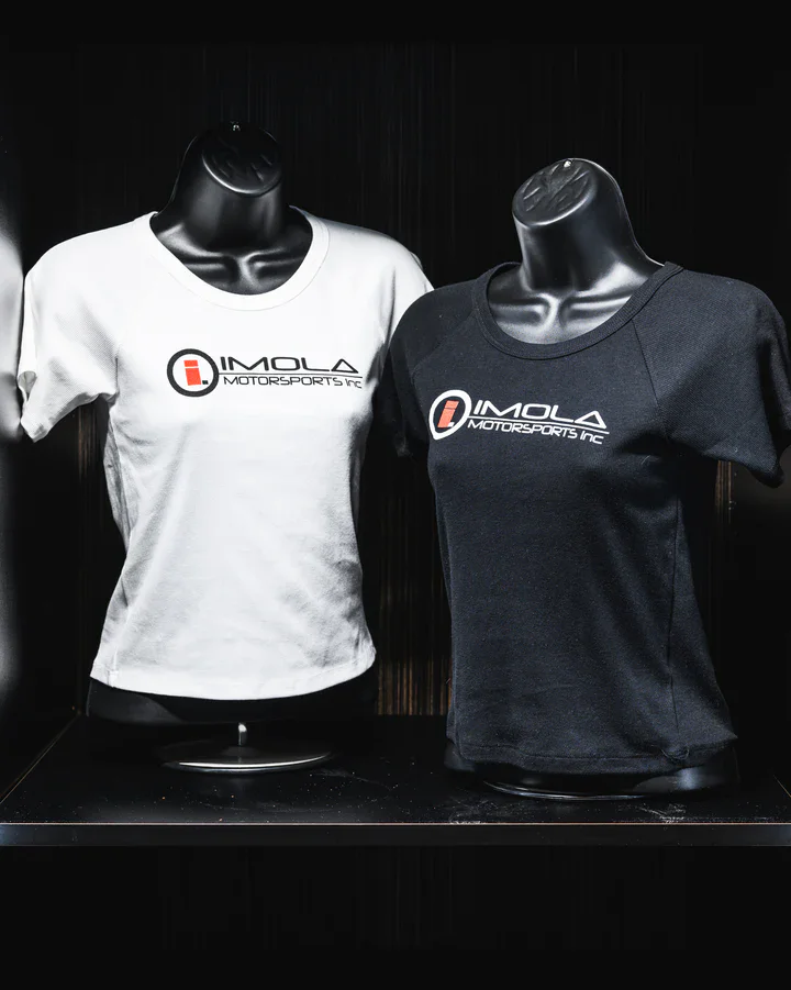 Imola Motorsports women's crop T-shirt in black and white, featuring the Imola Motorsports logo. Per.