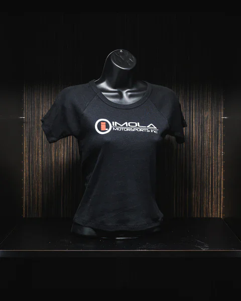 Black Imola Motorsports women's crop T-shirt on display.