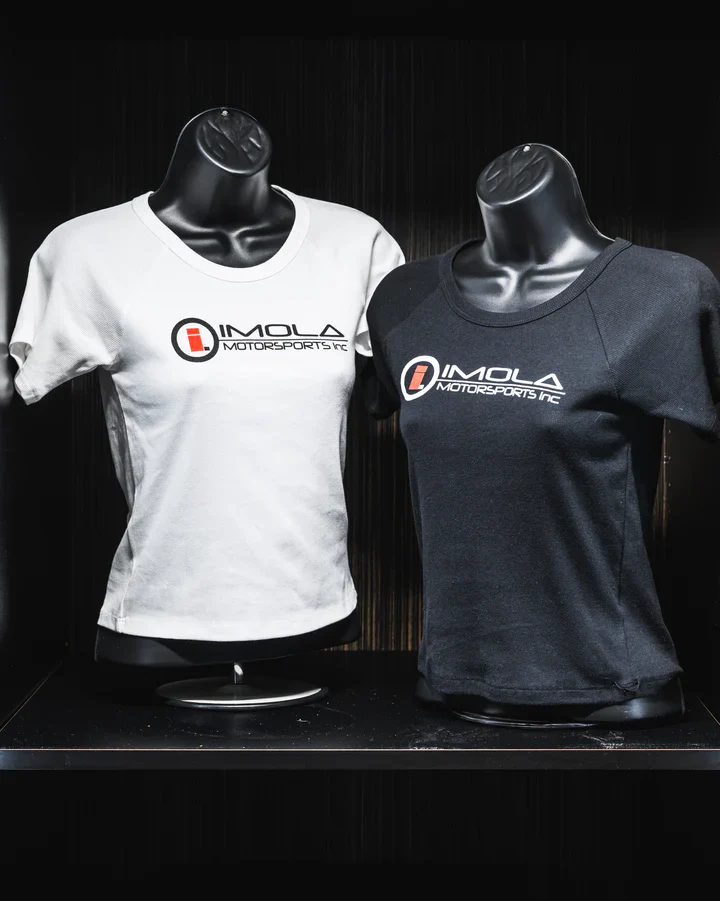 Imola Motorsports women's crop T-shirt in black and white, featuring the logo, perfect for motorspor.