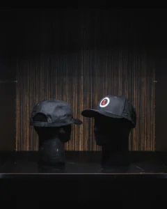 Black snapback hat with Imola Motorsports logo, stylish and sporty accessory.