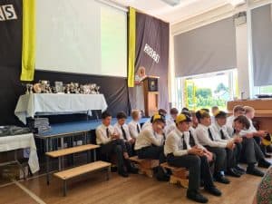 Group of students in a classroom at Inchmarlo School, engaging in educational activities.