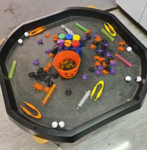 Educational science experiment with colorful objects and tools for hands-on learning.