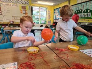 Children engaging with creative craft activities at Inchmarlo nursery.