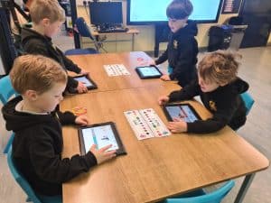 Children learning with tablets at Inchmarlo School.