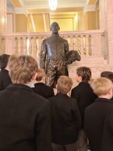 Students learning at Inchmarlo estate history tour.