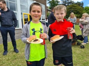 Children enjoying food and drinks at Inchmarlo.