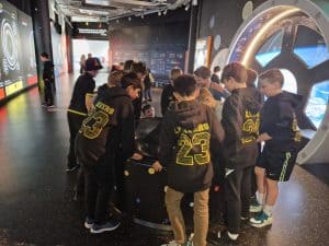 Children engaging in interactive science activities at Inchmarlo educational center.