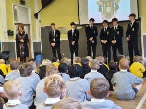 Group of students and teachers during assembly at Inchmarlo School.