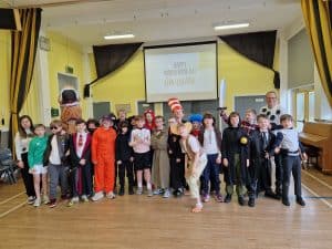 Children enjoying activities at Inchmarlo School in a vibrant classroom setting.