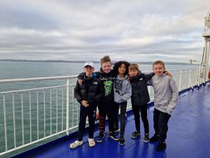 Group of children enjoying the outdoor space at Inchmarlo. Perfect for families and kids' activities.