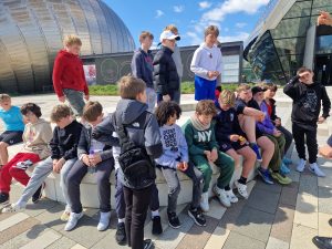 Group of children visiting Inchmarlo, outdoor educational trip at the scenic estate.