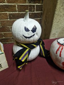 Festive carved pumpkin at Inchmarlo with Halloween decorations.