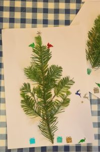 Decorative Christmas tree crafted from pine branches for festive celebrations.