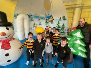 Children enjoying festive indoor activities at Inchmarlo, Aberdeen holiday resort.