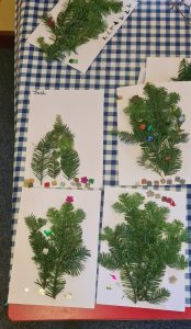 Decorative holiday wreaths with fresh greenery and festive ornaments at Inchmarlo.