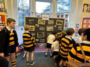 School children exploring history display at Inchmarlo School.