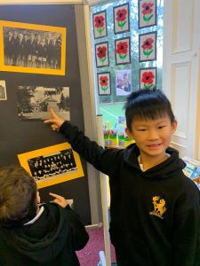 Young children exploring historical displays at Inchmarlo.