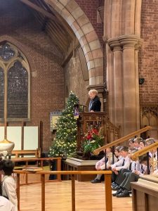 Interior of Inchmarlo Church during a festive event, showcasing historic architecture and community gathering.