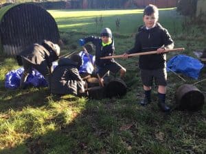Children exploring outdoor nature activities at Inchmarlo.