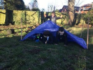 Children enjoying outdoor play and camping activities at Inchmarlo.