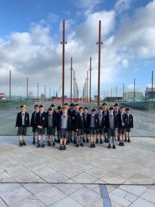 Group of students in school uniforms at Inchmarlo outdoor location, ready for educational outing.