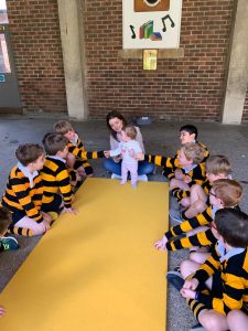 Children playing academically in a vibrant classroom setting.