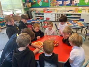 Children enjoying classroom activity at Inchmarlo Nursery and School.